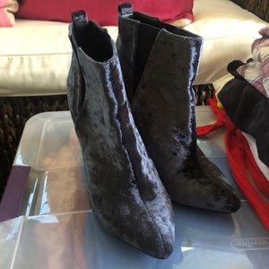 Purple velvet booties for winter festivities.